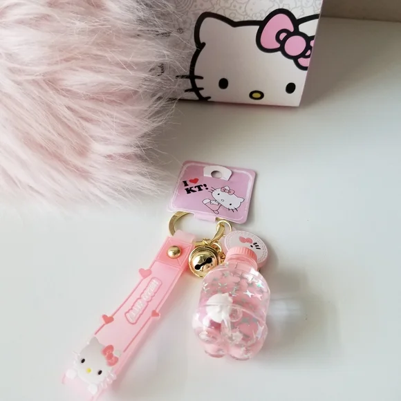 Hello Kitty Key Chain Floating Oil Liquid Acrylic Bottle Key Chain New - Picture 3 of 10